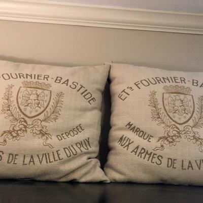 Pair of French theme pillows. 