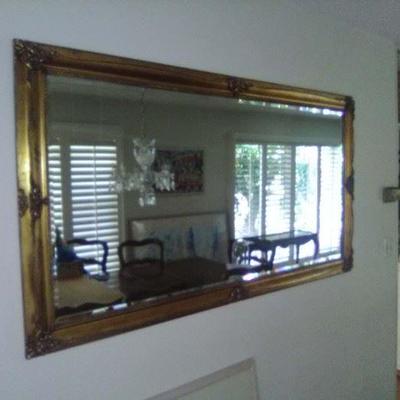 #38 Large gilt beveled mirror 5 feet by 3 feet