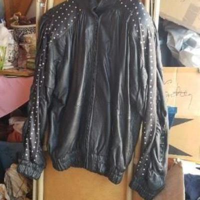 #46 1980's rivetted Leather jacket 