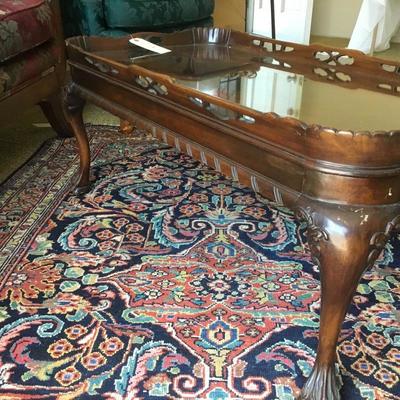 L-118 antique pie crust style coffee table, clawfoot and heavily carved