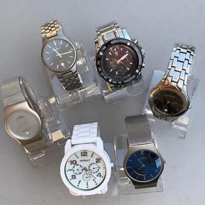 LOT 3 Six men''s quartz wrist watches