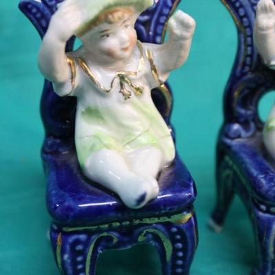 Child in Chair Porcelain Figurine Candle Holder Pair