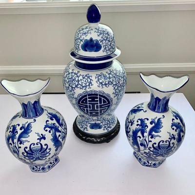 LOT 33 Blue and white ginger jar and a pair of vases