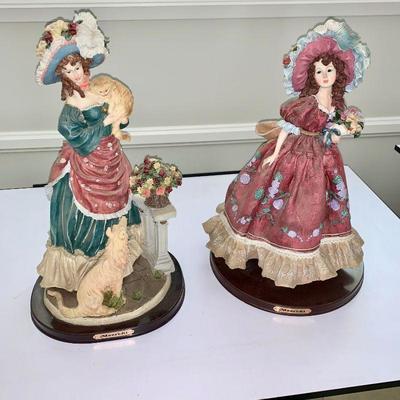 LOT 34 Pair of resin figurines