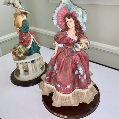 LOT 34 Pair of resin figurines