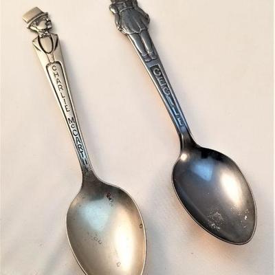 Lot #57  Pair of Collector Spoons - Charlie McCarthy and Dionne Quints