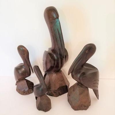 Lot #64  Flock of Carved Wooden Pelicans