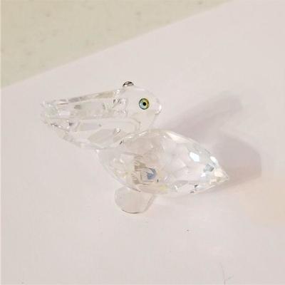 Lot #66  Lot of two crystal Pelicans, one Swarovski