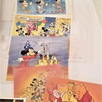 Lot #75  14 Packets of Collectible Disney Postage Stamps (unused) with COA's and box