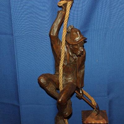 Lot 351: Large Hand Carved Mountain Climber