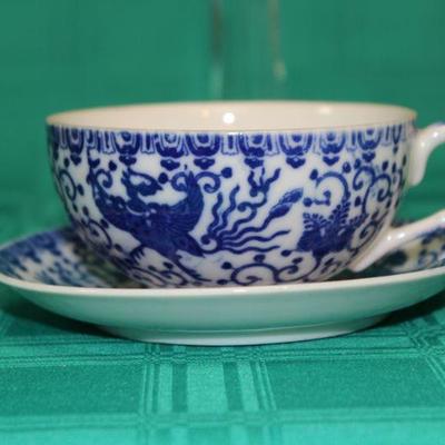 Blue and White Asian Pattern Tea Cup and Saucer