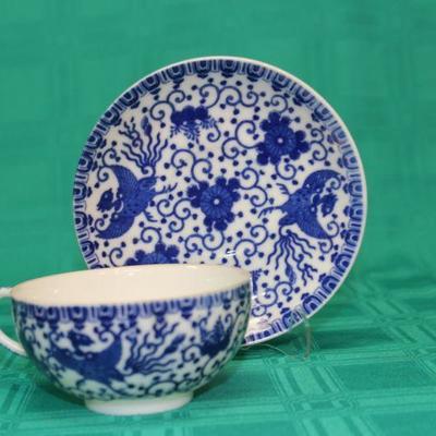 Blue and White Asian Pattern Tea Cup and Saucer