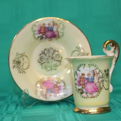 Yellow Victorian Couple Demitasse tea Cup and Saucer