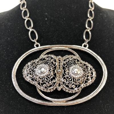 Large statement piece necklace silver tone looks like owls face