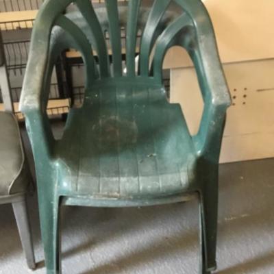 Two plastic outdoor patio chairs Lot 1393