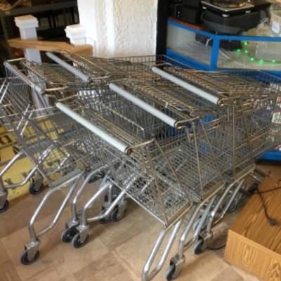 Six metal shopping carts lot 1423
