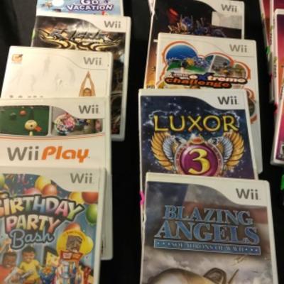 16 Nintendo Wii games, with exercise accessories  lot 1461