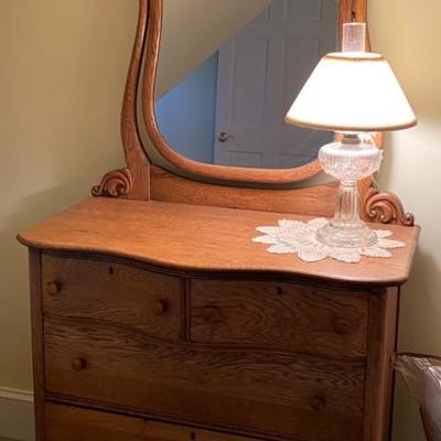 Lot #130 Antique Oak Dresser and Mirror with oil lamp 