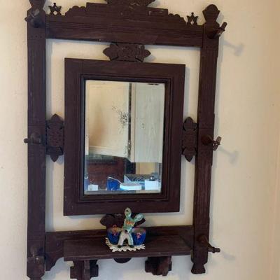 Ornate mirror / hat hook