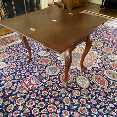 Lot # 10 Reproduction Queen Anne Style Flip top Table  