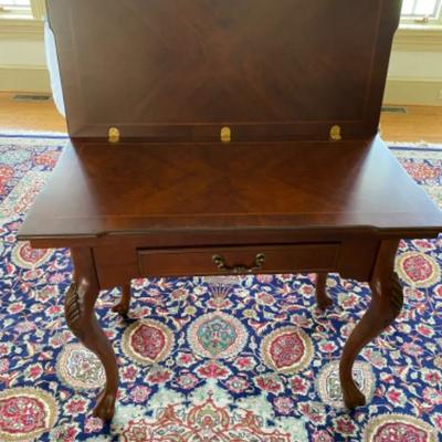 Lot # 10 Reproduction Queen Anne Style Flip top Table  