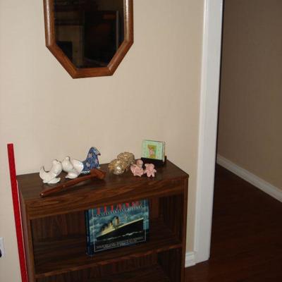 Bookcase, Mirror, wood judges gavel hammer, Titanic book