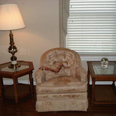 2 glass top end tables, 1 lamp and a swivel rocking chair