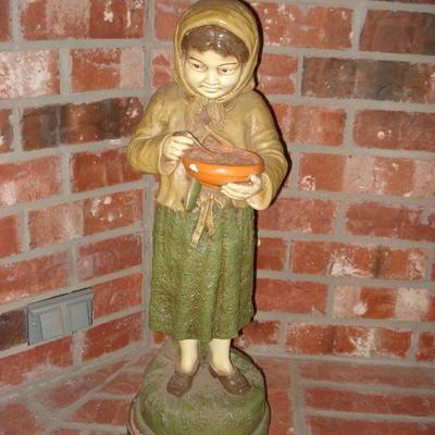 Girl or Lady statue that's unusual 