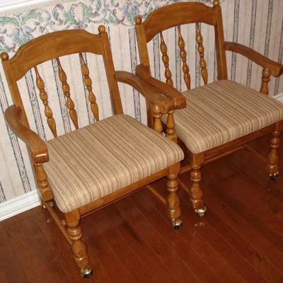 Great wooden and cloth seated chairs on castors