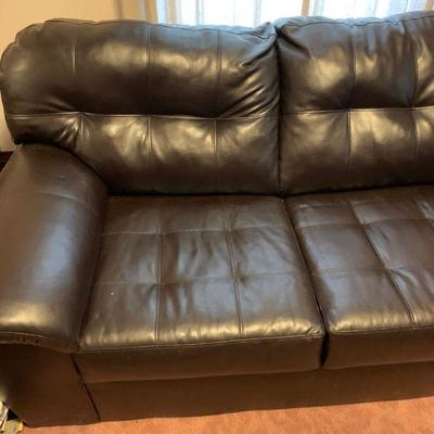 Black leather sectional sofa