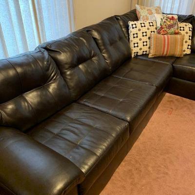 Black leather sectional sofa