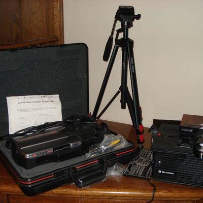 Vintage camcorder, tripod and slide projector Bell & Howell
