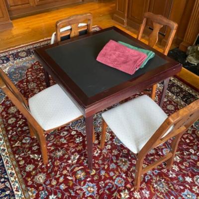 Lot # 47 Wooden card table with 4 folding wooden chairs 