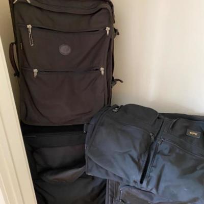 Lot # 69 Luggage lot w/ TUMI Clothing Bag 