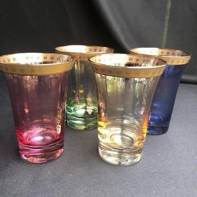 Set Of 4 Multi Colored iridescent Glasses with Gilt Trim. 