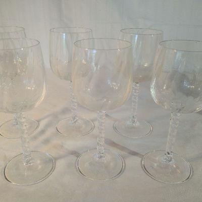 Assorted shot glasses and wine glasses