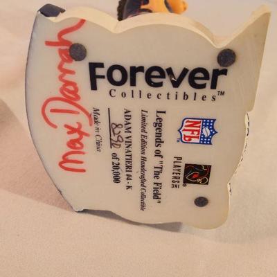 Adam Vinatieri bobblehead and Doug Flutie hat