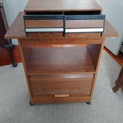 Tv stand with VHS holder