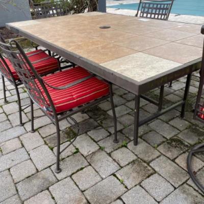 Lot # 205 Large Outdoor Metal and Tile Table with 6 Chairs / Cushions 