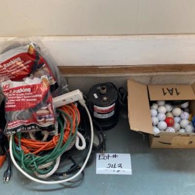 Lot # 243 Lot of Cords, Heat Pump Risers, golf Balls 