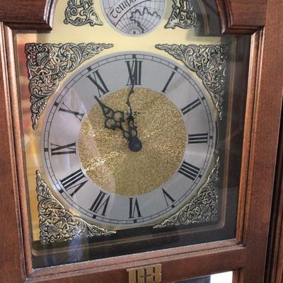 Grandfather Clock from Herman Miller, glass front access door.
