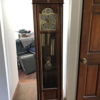 Grandfather Clock from Herman Miller, glass front access door.