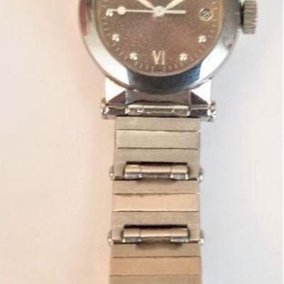 Lot #33  Ladies Movado Vizio Wrist Watch with time/date