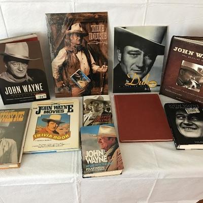 Lot #534 John Wayne Books and Tin Sign