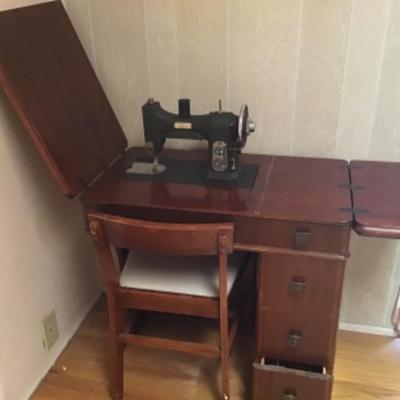 B3-110 White Sewing Machine in a sewing cabinet