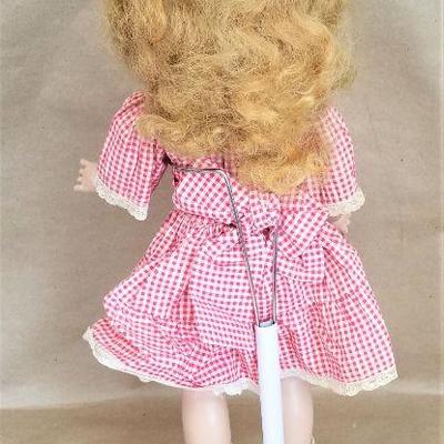 Lot #49  Vintage Composition Doll on Stand - original clothing