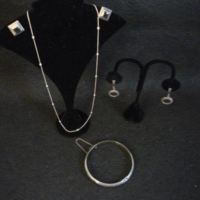 4 PIECES OF STERLING SILVER - 2 PAIRS EARRINGS, BANGLE AND NECKLACE