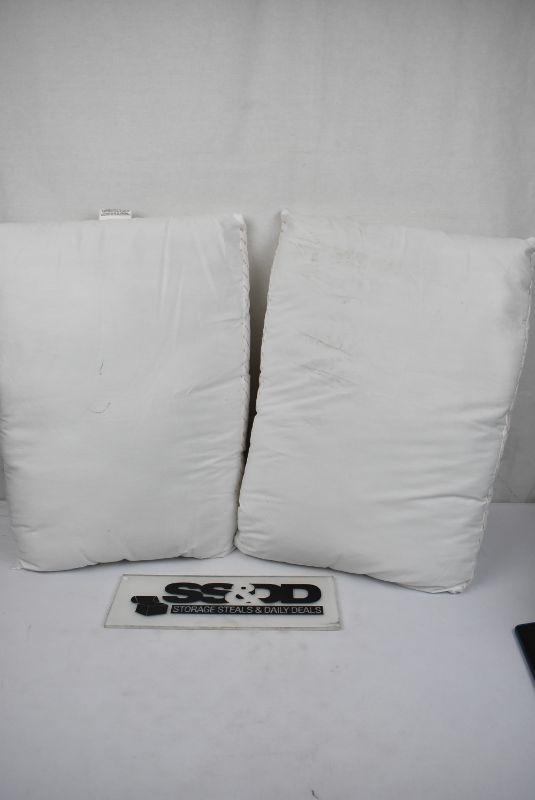 2 Standard Size Pillows, Medium Firmness. Warehouse Dust