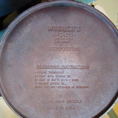 K105 - 2 Cast Iron Kitchen Pieces - 1 is Wager Ware