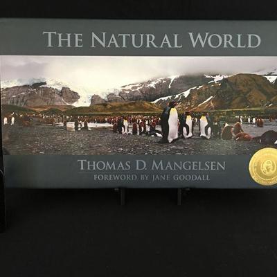 The Natural World large award winning coffee table photo book by Thomas D Mangelsen plus cloth cover. Item #17